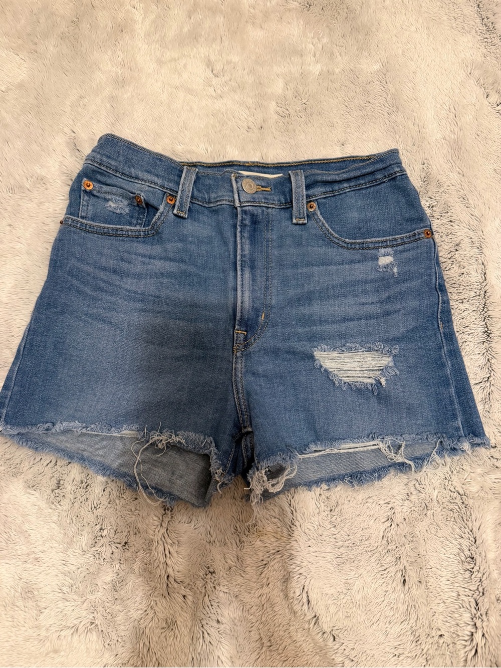 Levi's Medium Blue Distressed Denim Shorts